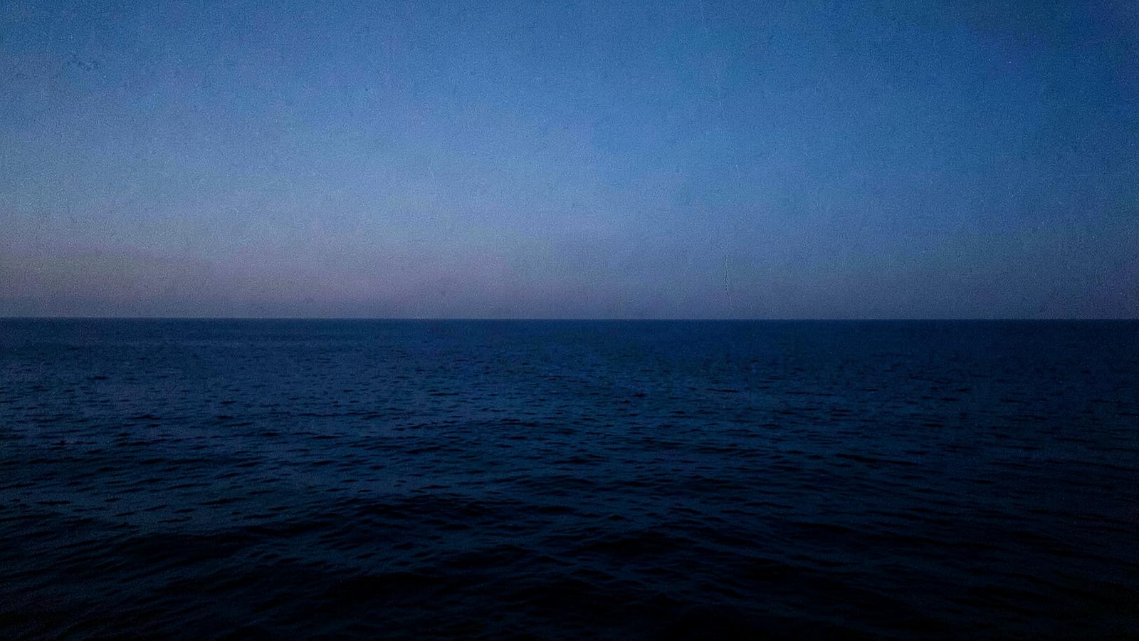 Calm Maldivian ocean at blue hour